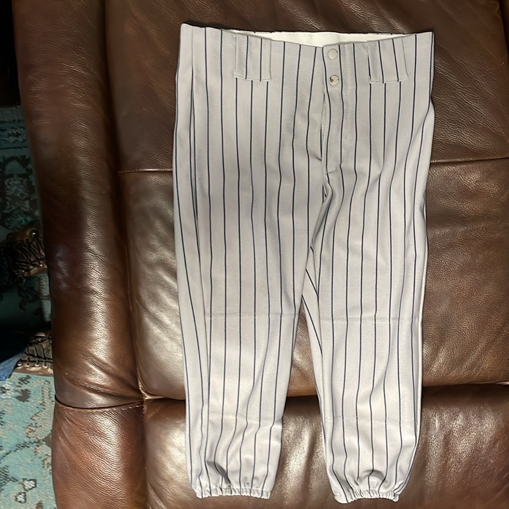 Three pair of baseball pants